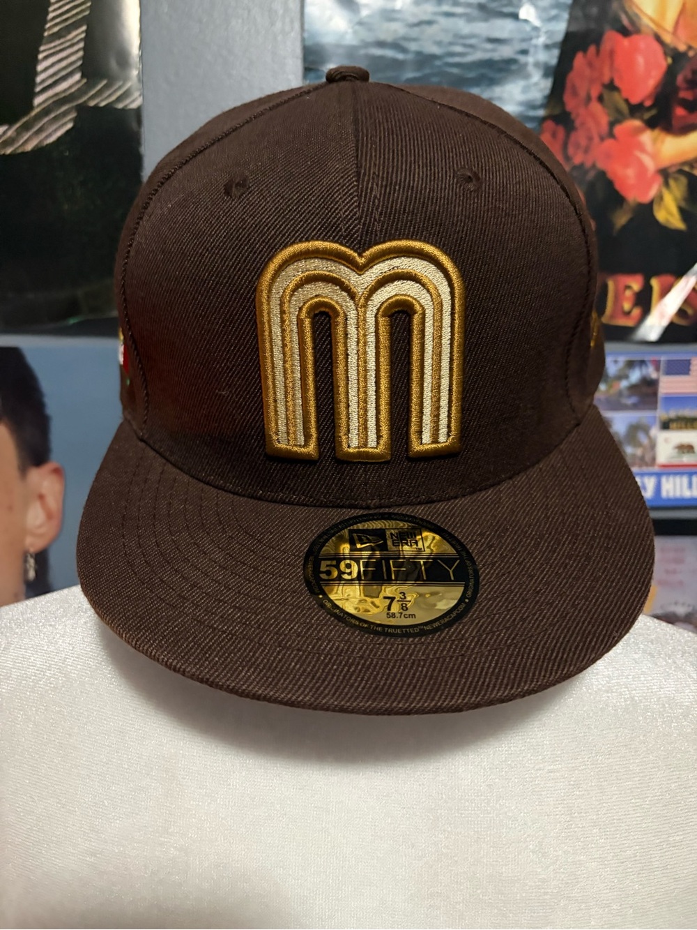 New Era Brown Snapback Hat with Gold Embroidered M Logo